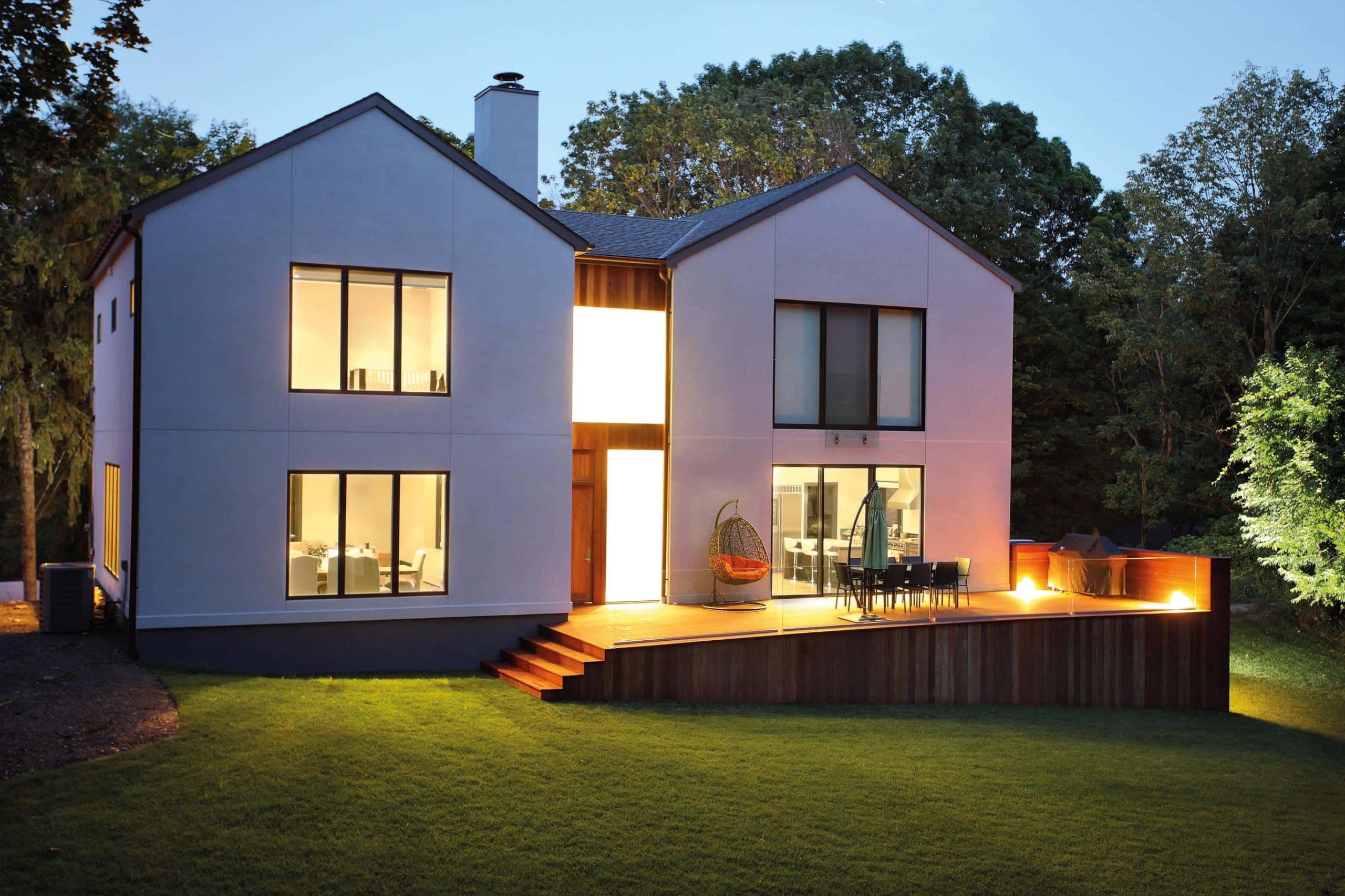 large home lit up with lights featuring residence² windows